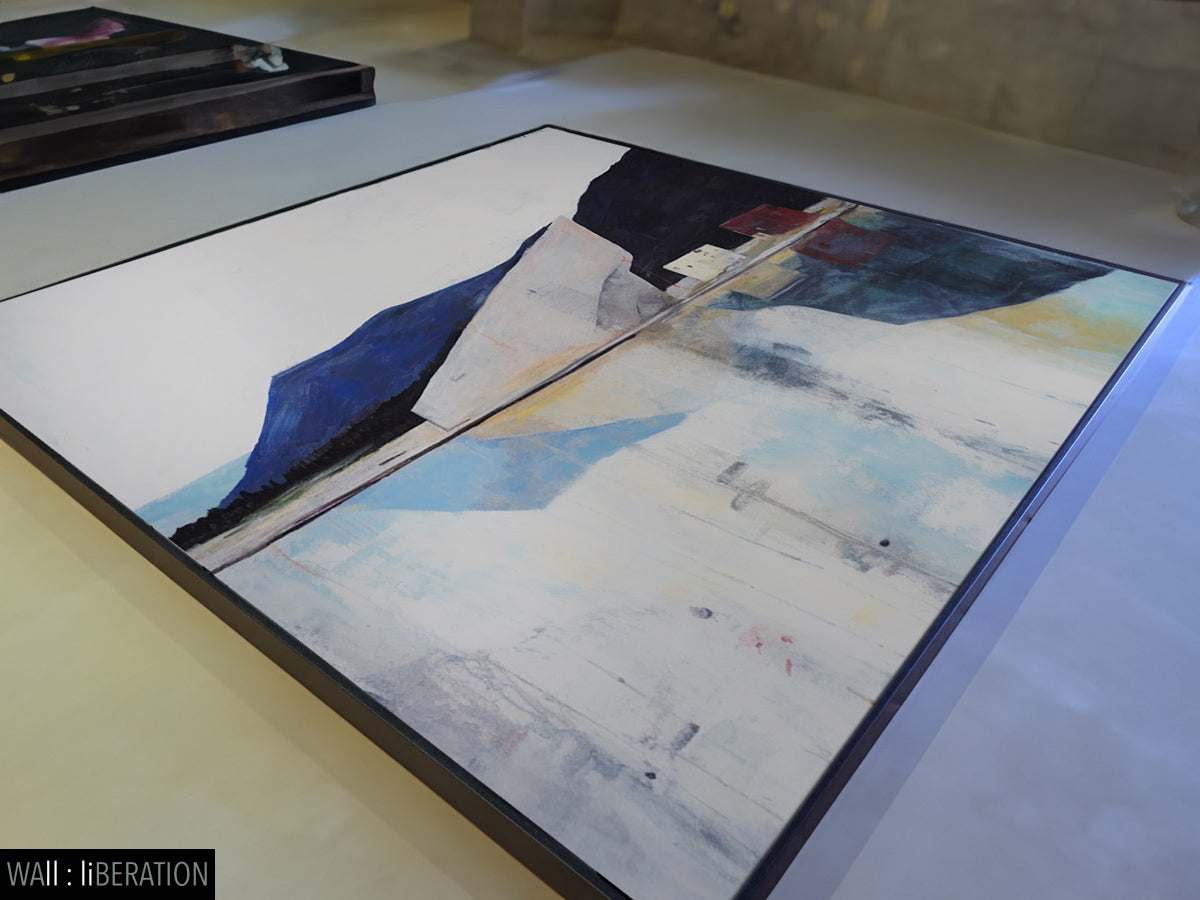 Like a Mirror Large Abstract Coastal canvas wall art framed and hung on a wall