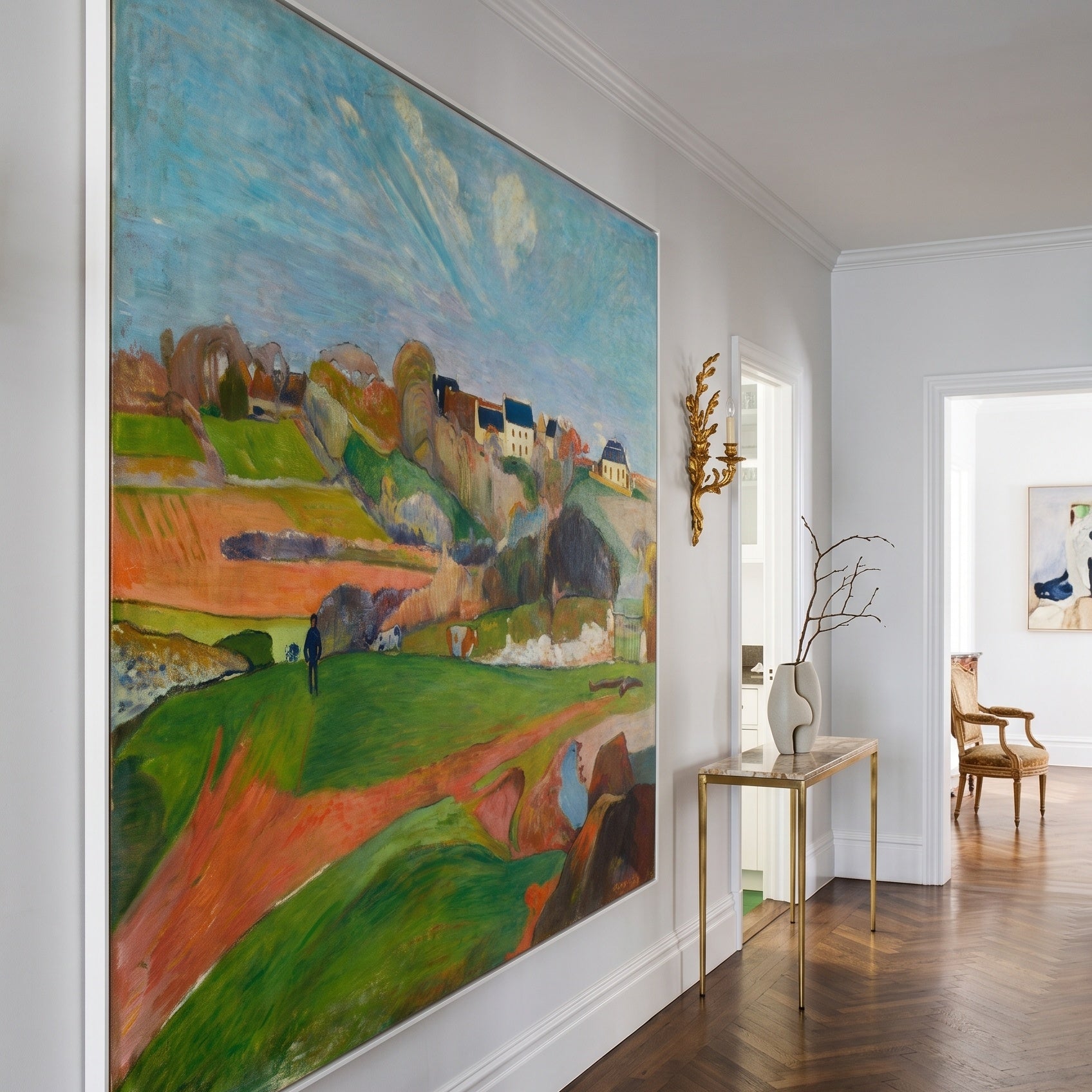 Landscape at Le Pouldu by Paul Gauguin — large light blue and green Impressionist canvas art on a hallway wall