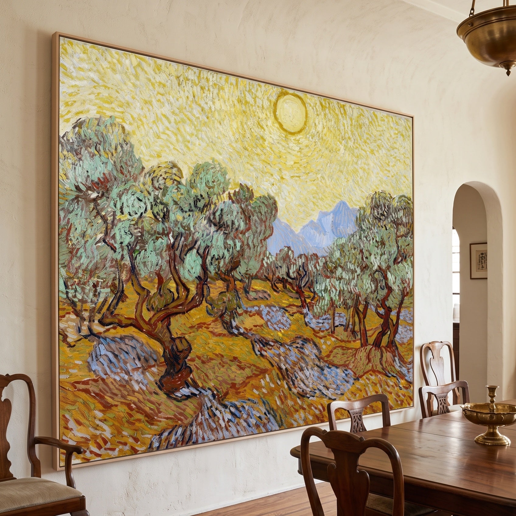 Olive Trees with Yellow Sky and by Vincent van Gogh — large yellow and orange Impressionist canvas art displayed on a wall