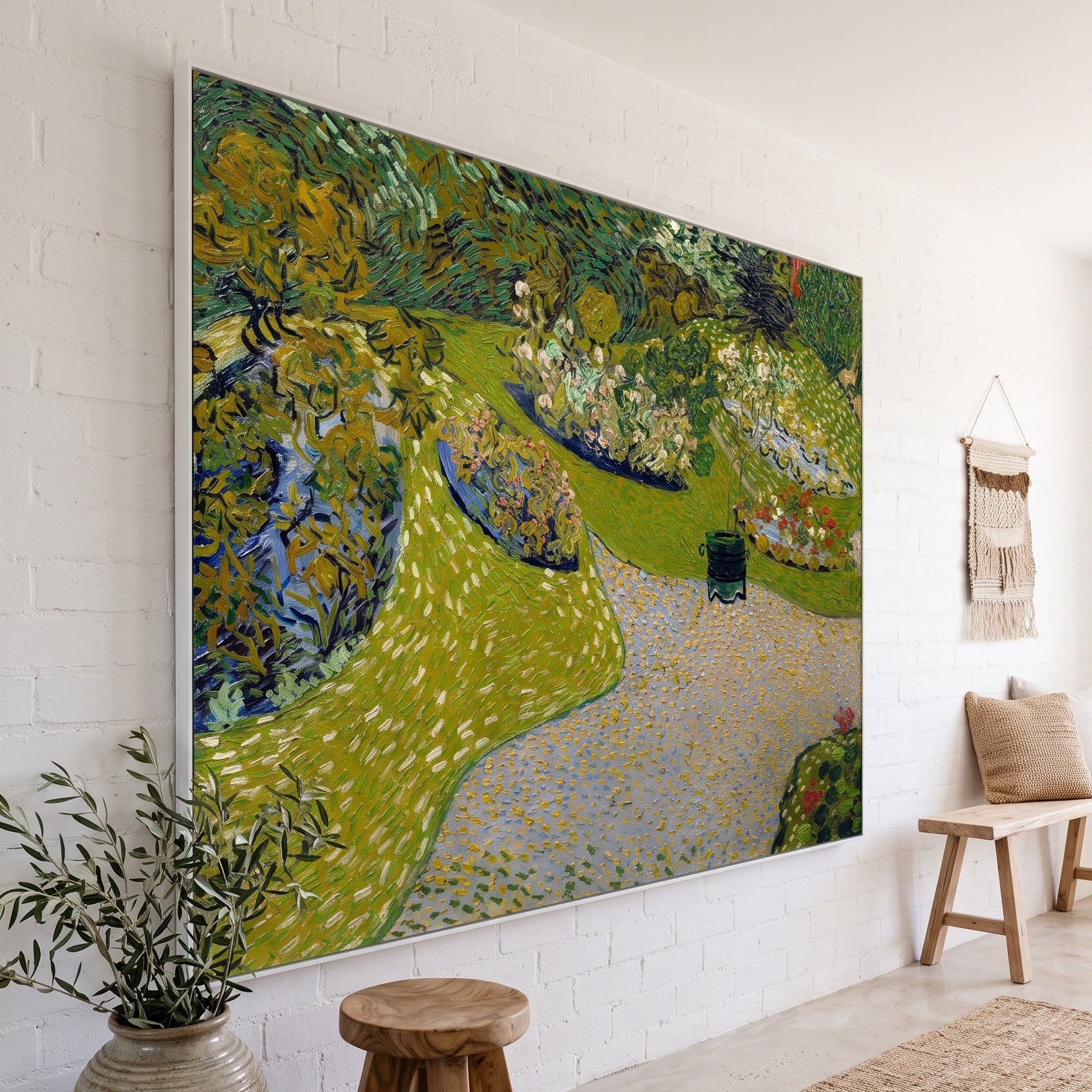 Garden in Auvers by Vincent van Gogh — large green and blue Impressionist canvas art on a living room wall