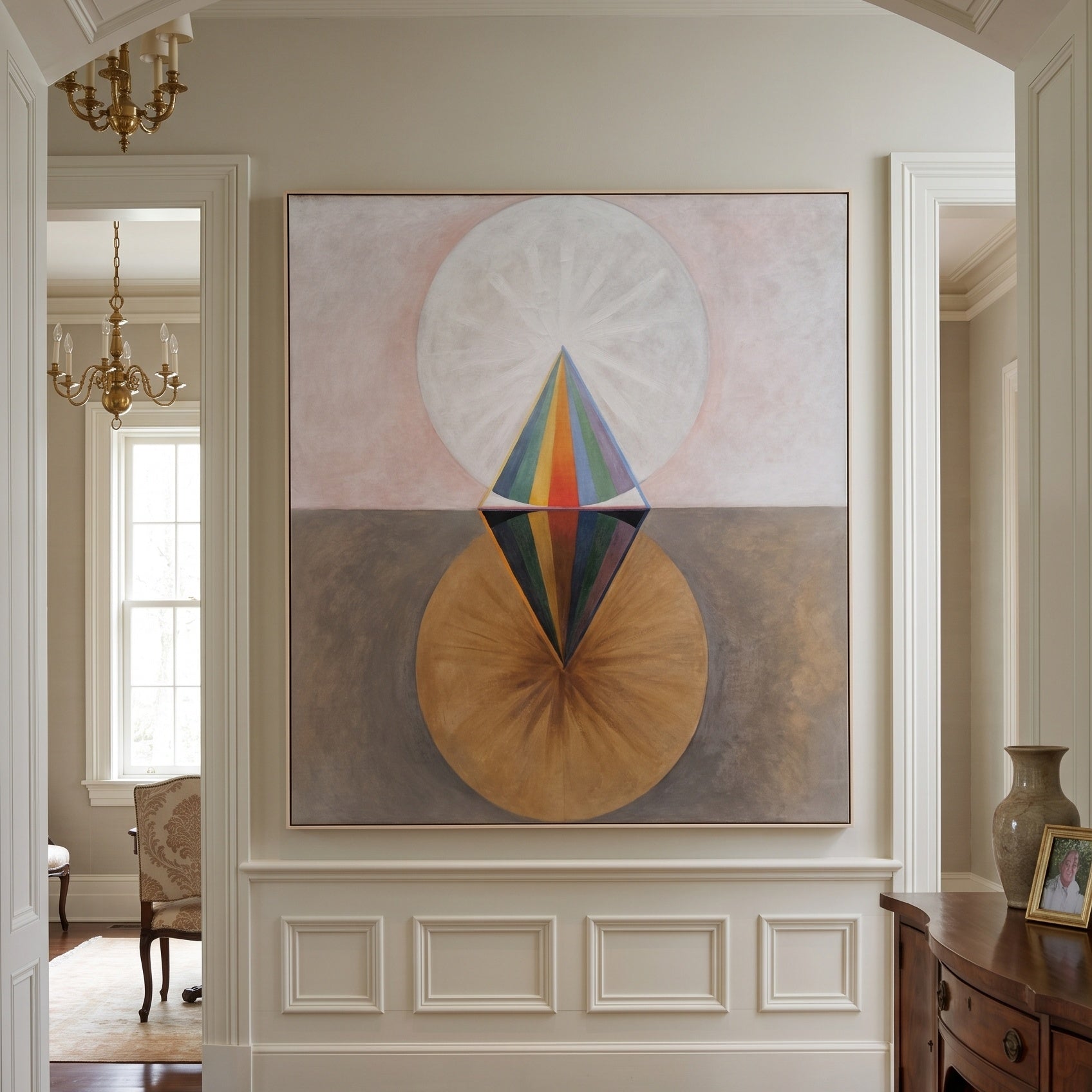 The Swan, No. 12, Group IX by Hilma af Klint — large brown and white Geometric Abstract canvas art on a hallway wall
