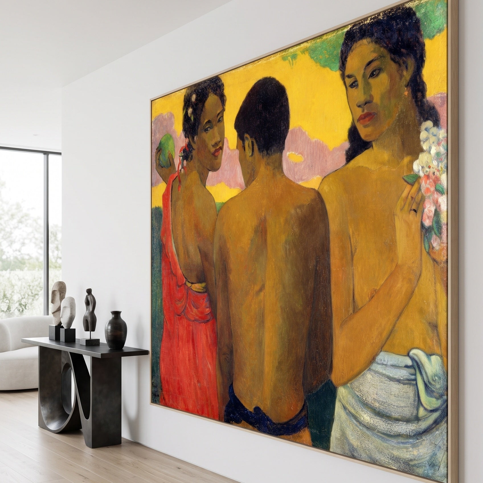 Three Tahitians by Paul Gauguin — large brown and yellow Impressionist canvas art on a hallway wall