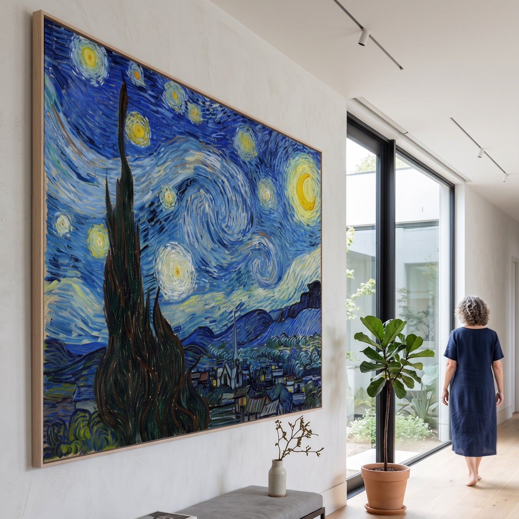The Starry Night by Vincent van Gogh — large blue and yellow Impressionist canvas art on a entryway wall