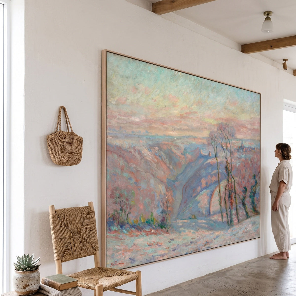 Gelée blanche au village de Crozant by Armand Guillaumin — large pink and blue Impressionist canvas art on a living room wall
