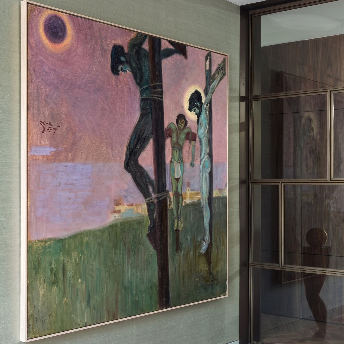 Crucifixion with Darkened Sun by Egon Schiele — large pink and green Expressionist canvas art on a entryway wall