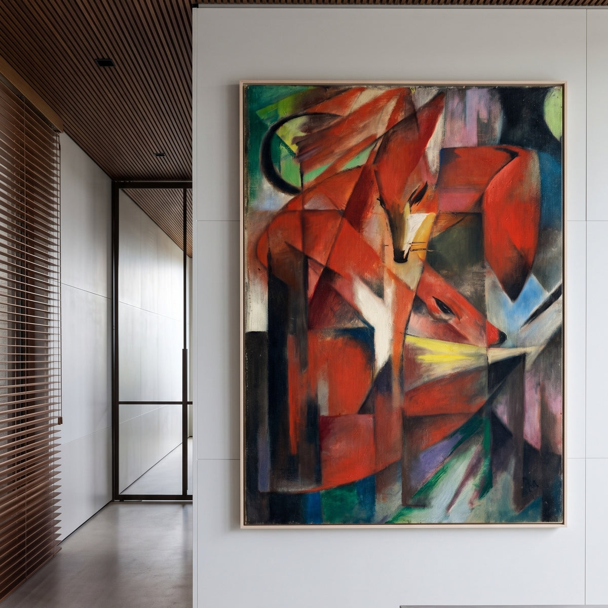 The Foxes by Franz Marc — large red and black Expressionist canvas art on a hallway wall