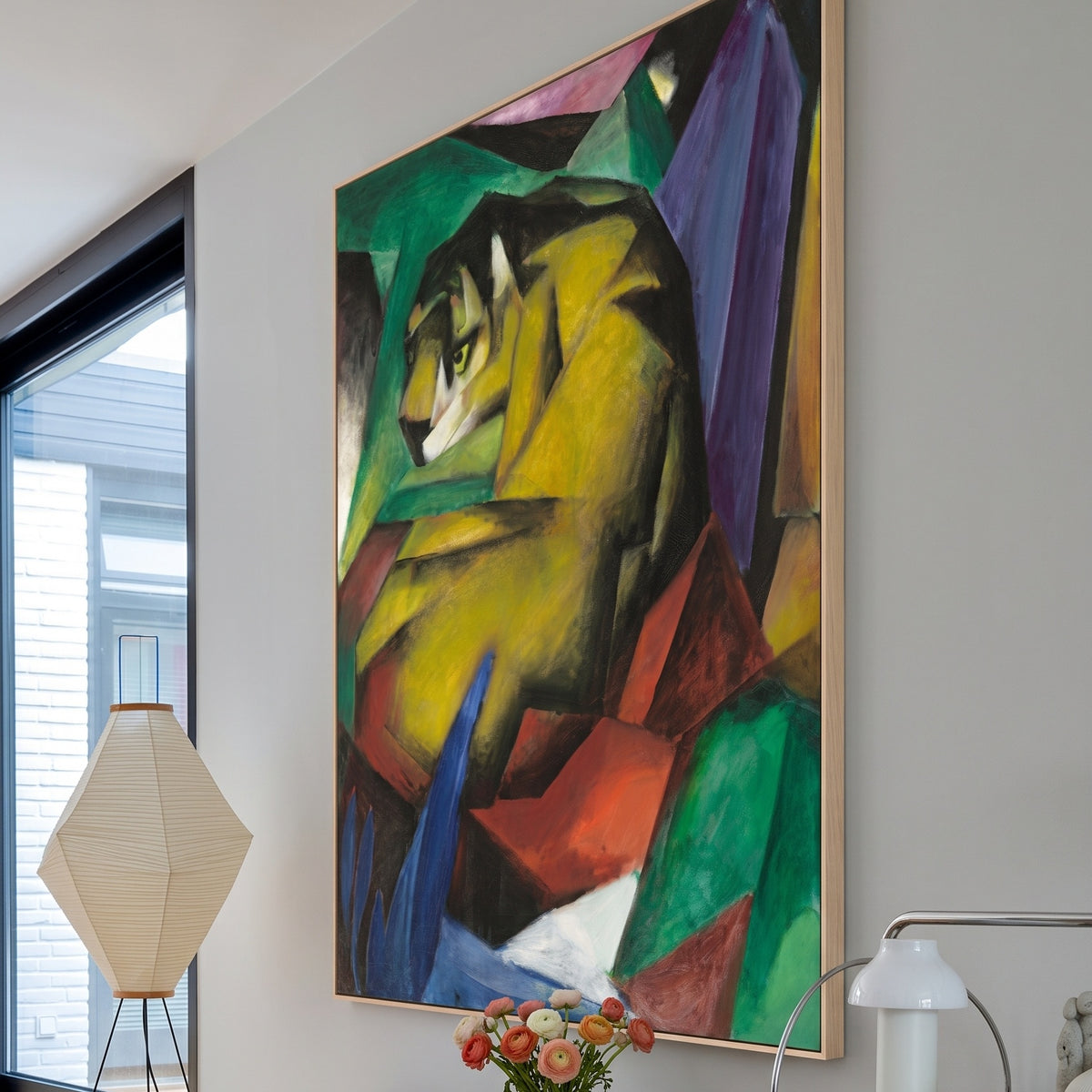 Tiger by Franz Marc — large yellow and green Expressionist canvas art on a living room wall