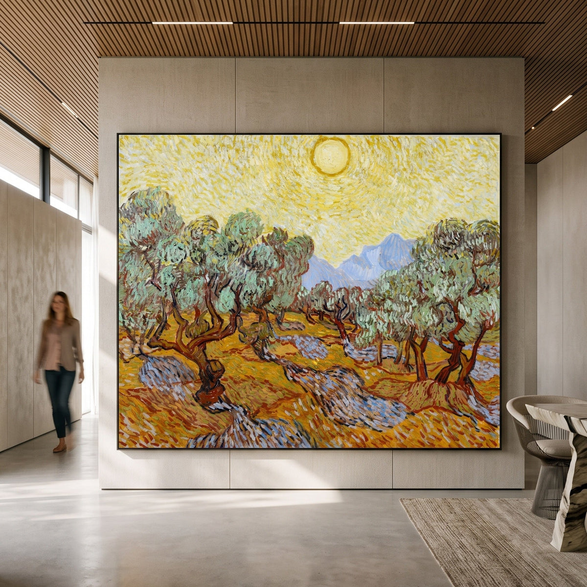 Olive Trees with Yellow Sky and by Vincent van Gogh — large yellow and orange Impressionist canvas art on a hallway wall