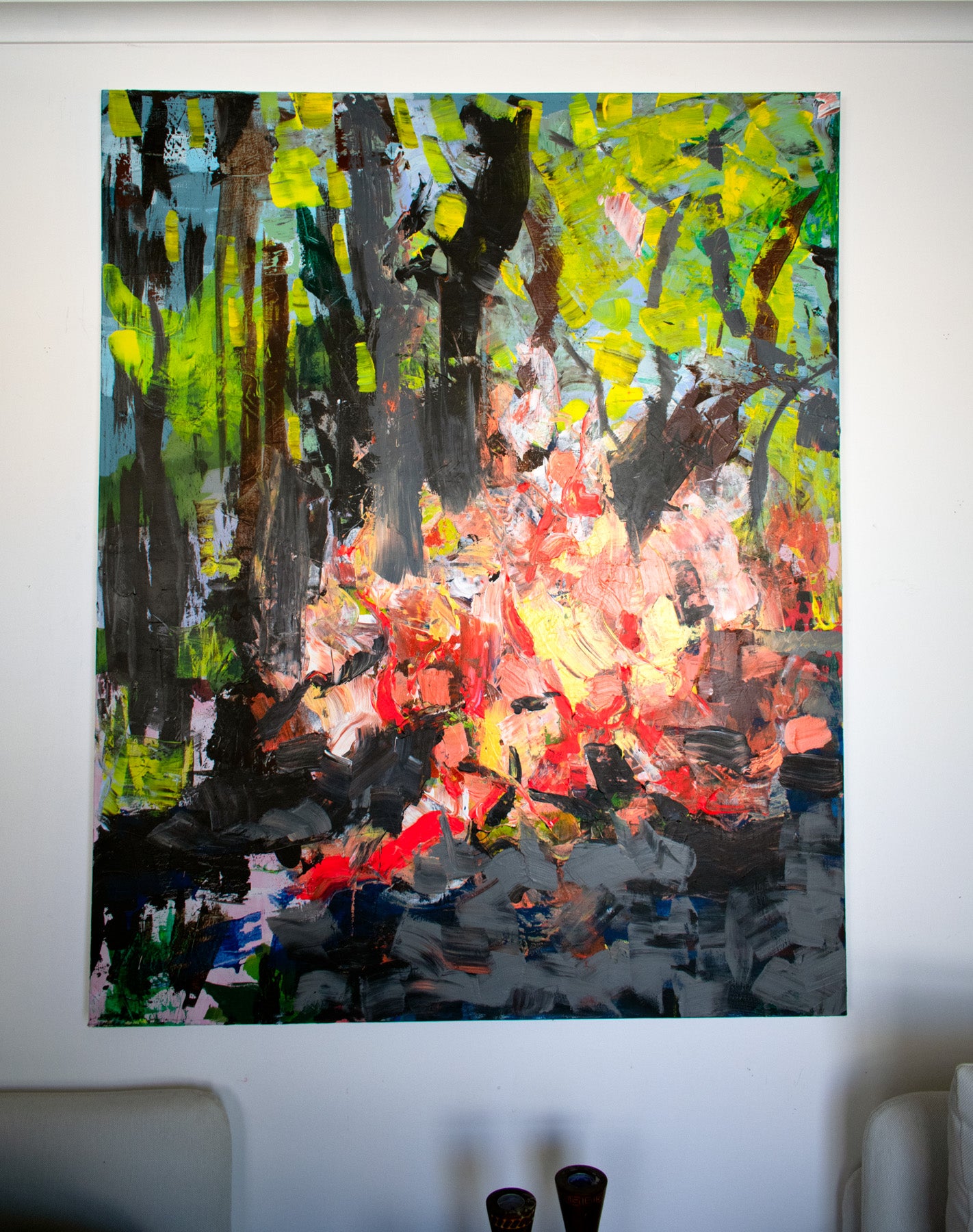 Camping with a Fire Oversized Abstract canvas wall art framed and hung on a wall